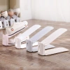 Creative plain double-layer adjustable simple shoe rack Application Scenario